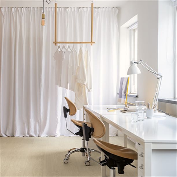 home office with a beige vinyl floor